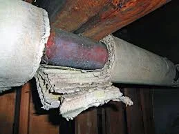 Aged and deteriorating pipe insulation found during asbestos inspection and assessment