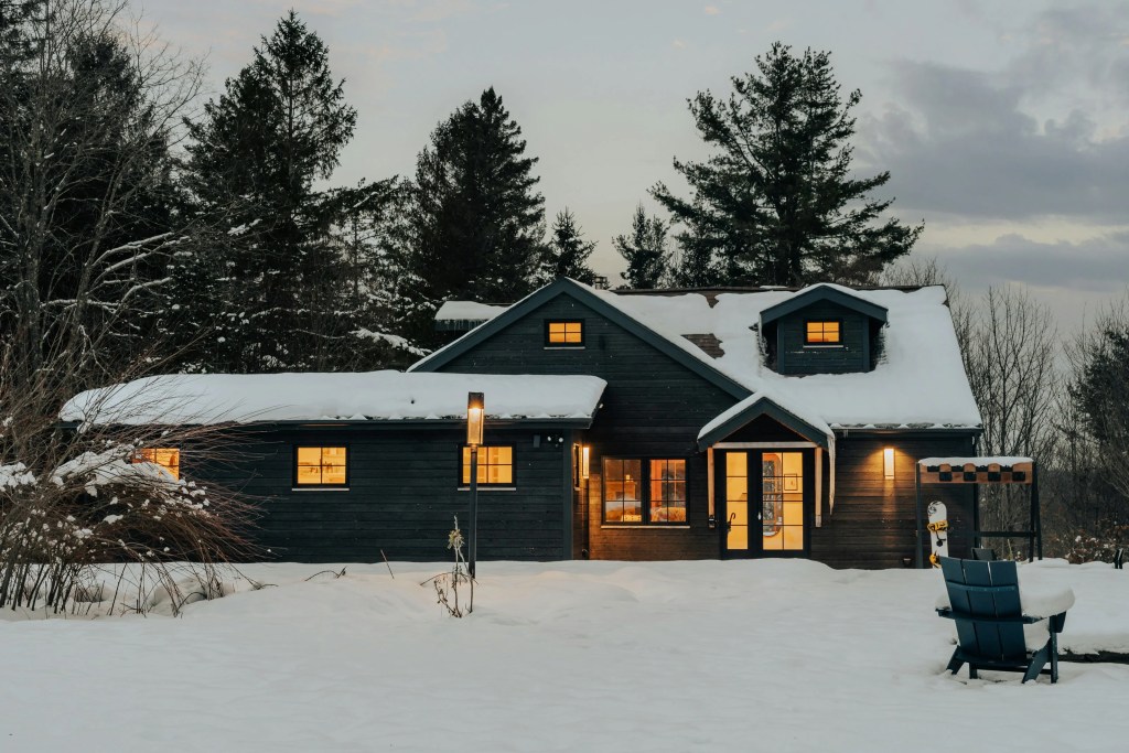 Cold weather and snow buildup highlighting what causes mold in a house during winter