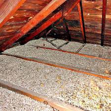 Attic insulation material highlighting how to identify asbestos in insulation during visual checks