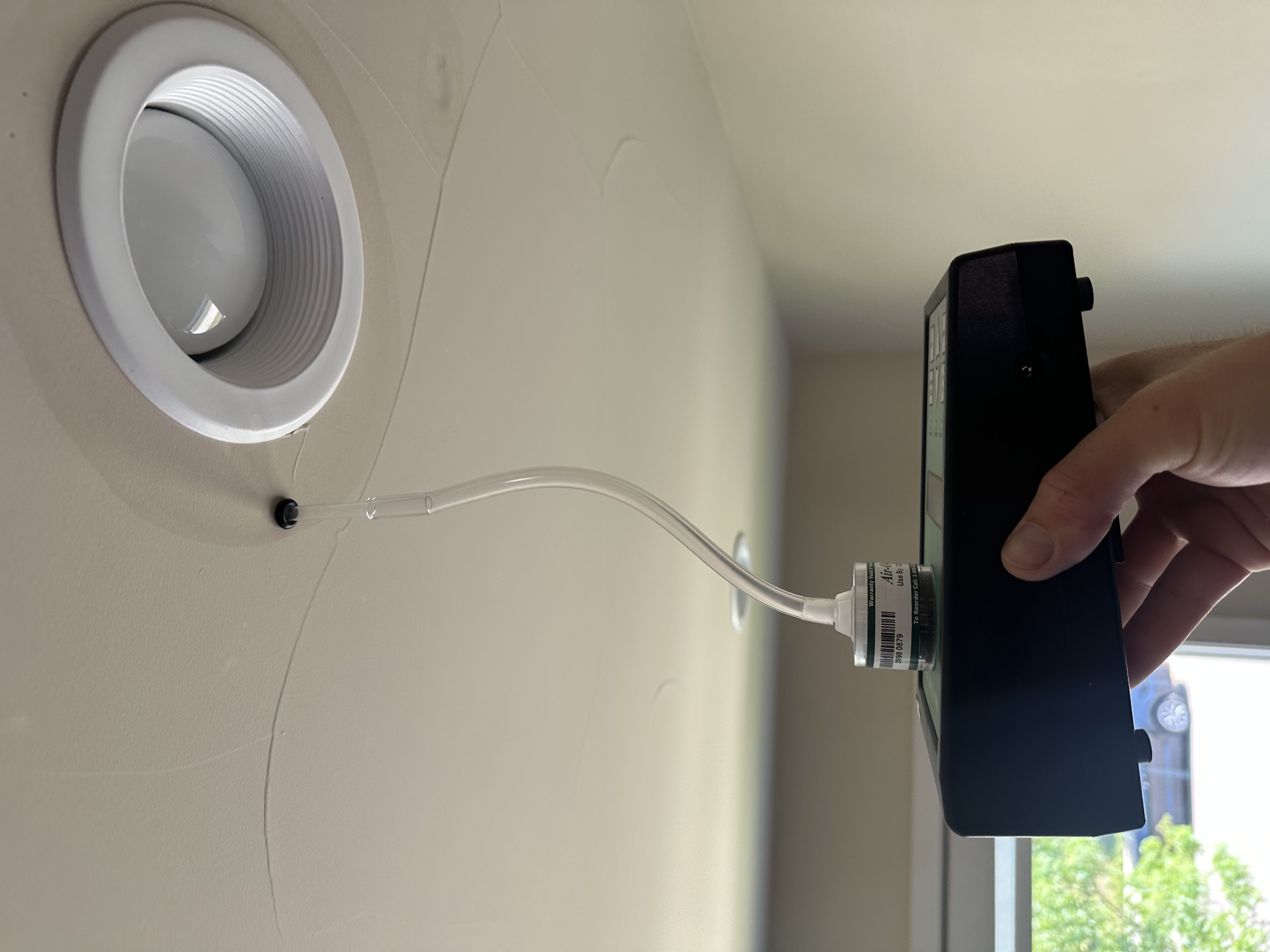 Air sampling in a wall cavity.